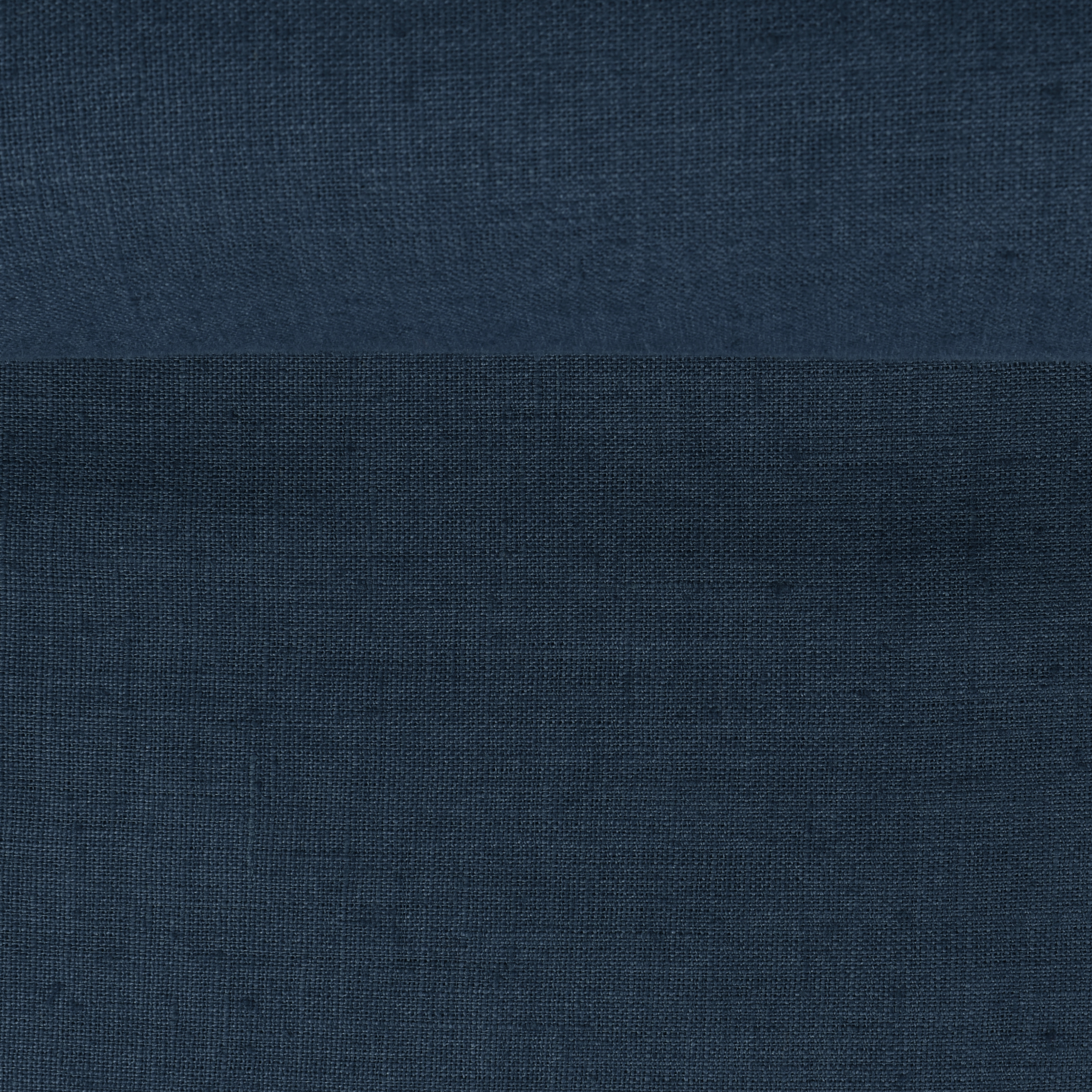 Washed linen fabric in dark blue black, 205 g/m²